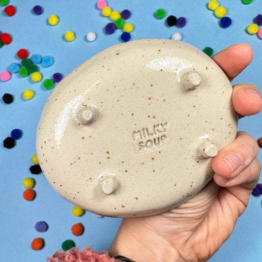 Soap dish in a red harlequin pattern