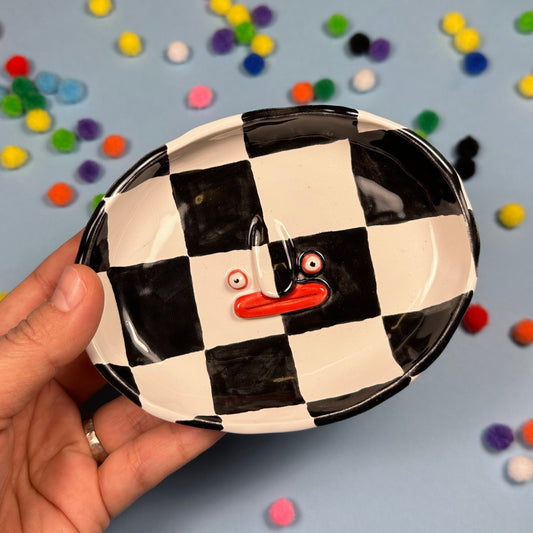 Soap dish with a checkered pattern
